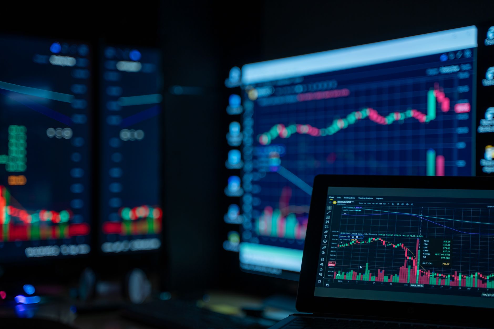 Monitors displaying stock market charts in a dimly lit room, perfect for finance and trading themes. — Forex Market Insights